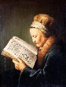 Portrait of an old woman reading